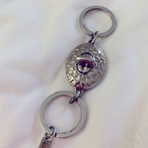 Coach silver tone turn lock valet keychain